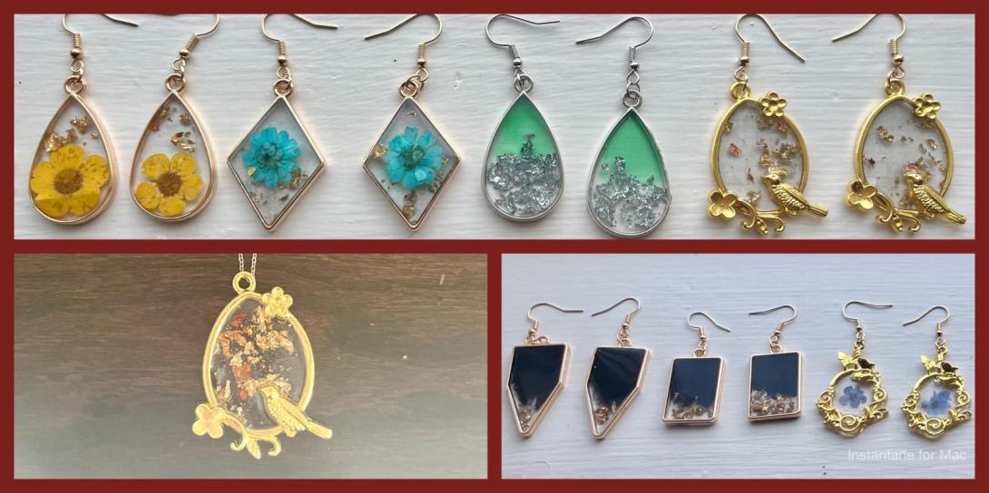 A collage of handmade resin jewelry featuring botanical and celestial designs: the top row showcases various earrings with dried flowers, glitter, and tiny embellishments in teardrop, diamond, and oval frames. The bottom row shows a matching pendant with a gold bird and floral border (left), and more earrings with navy resin, gold flakes, and ornate gold frames (right).